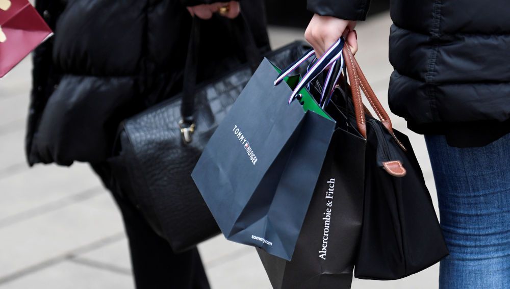 People carry their shopping bags in downtown Hamburg