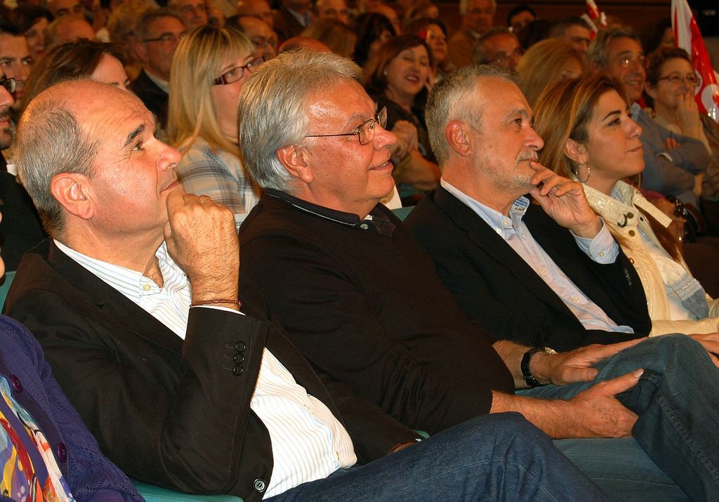 Griñán en un acto de partido junto a Felipe González.