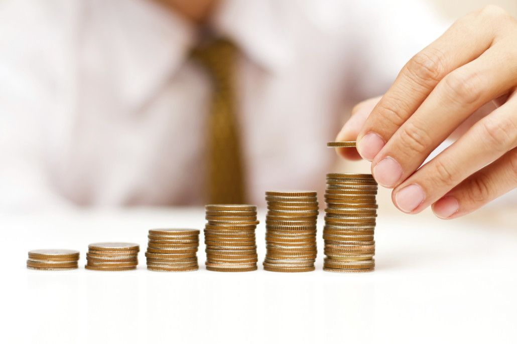 a man rising coins