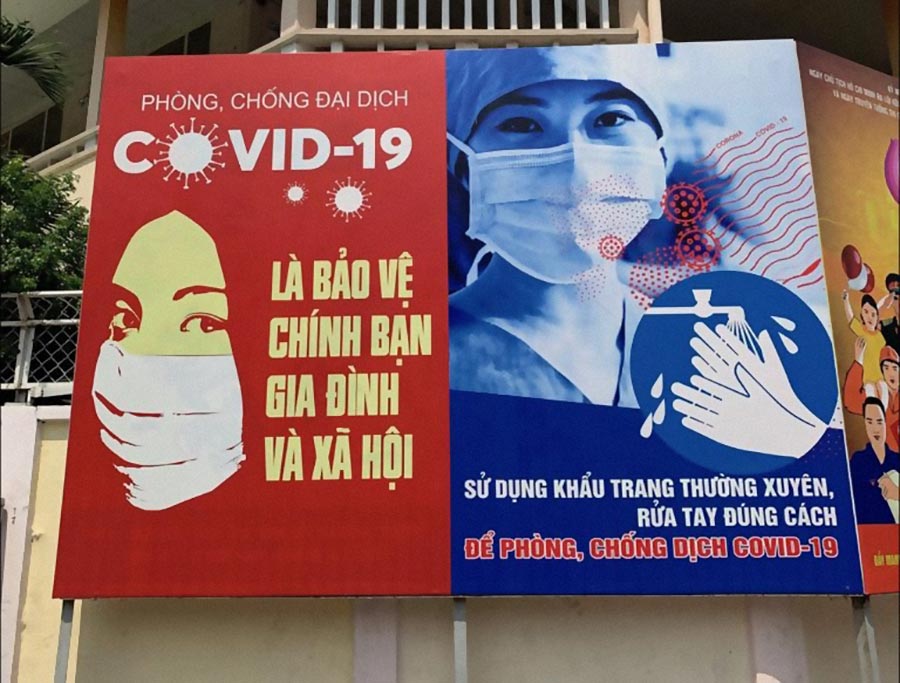 Cartel aviso Covid en Vietnam