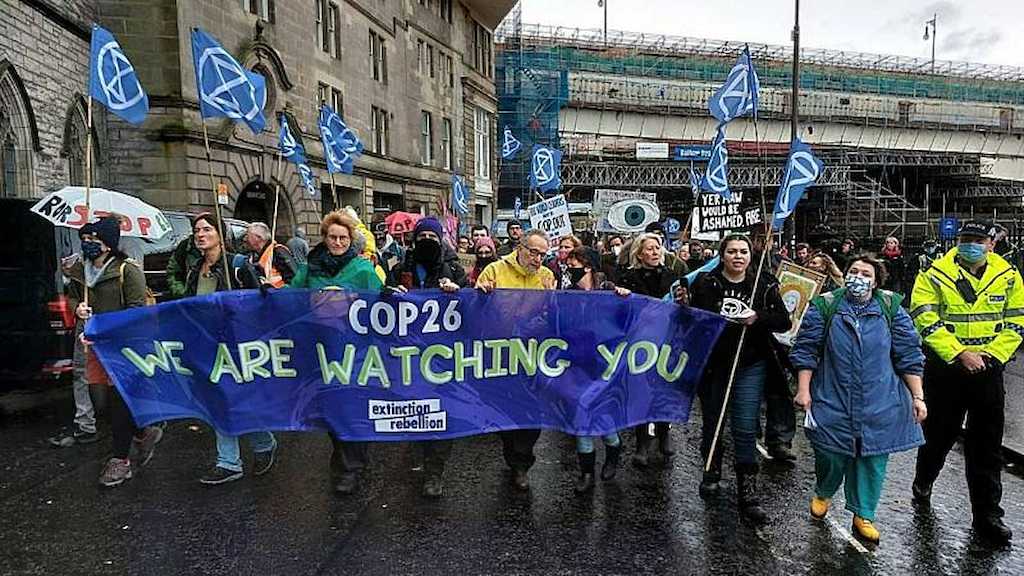 Manifestantes durante la cumbre de Glasgow sobre el clima.